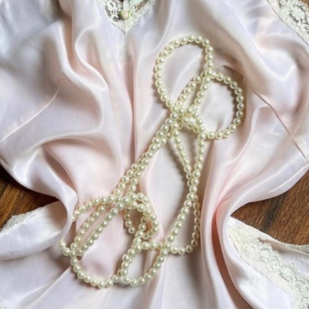 Extra long faux pearl necklace